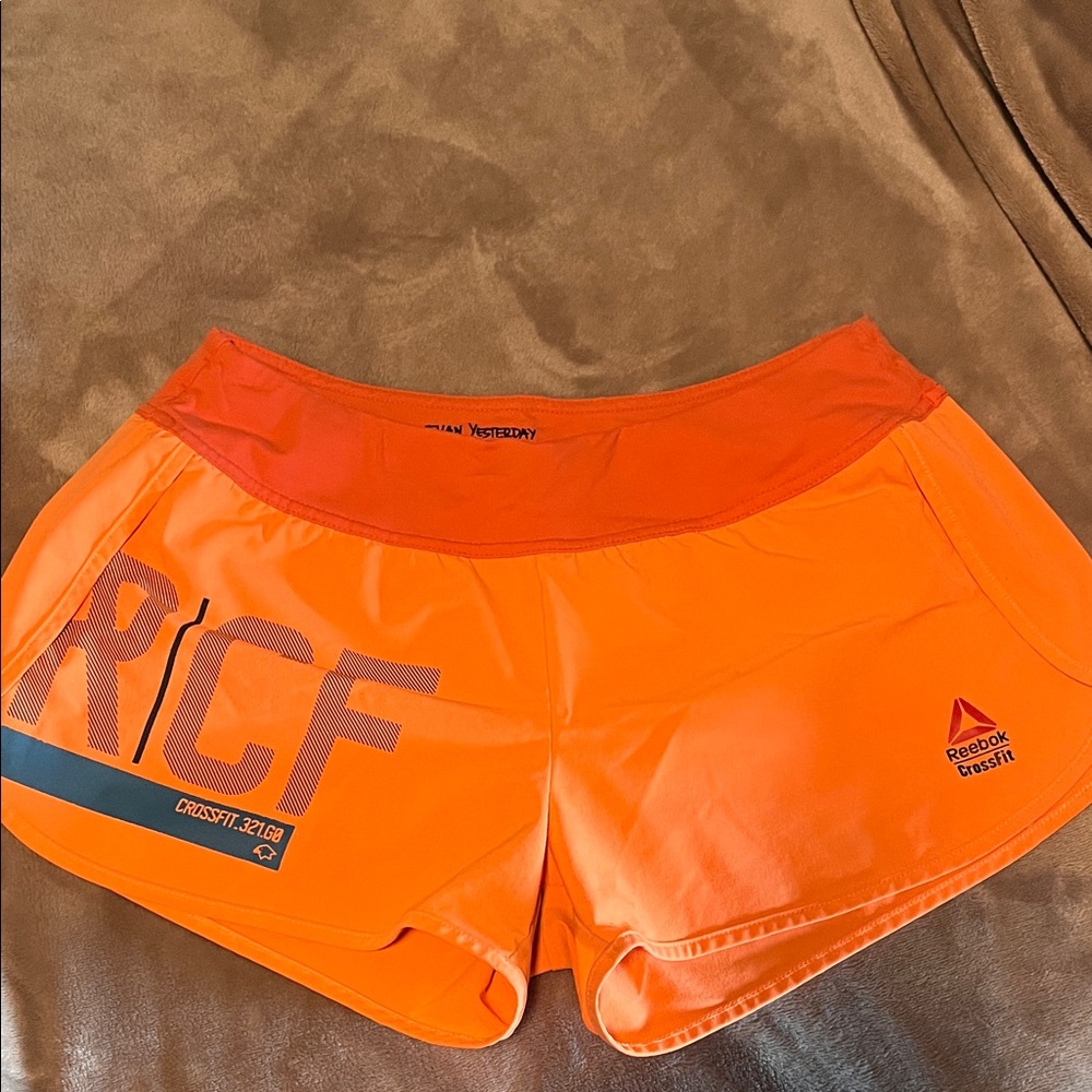Reebok Women's Bright Orange Athletic Shorts